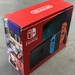 Nintendo Switch with Red and Blue Joy-Cons